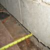 Foundation wall separating from the floor in Silt home