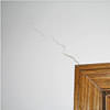 wall cracks along a doorway in a Gypsum home.