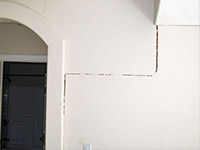 Drywall cracking due to foundation settlement in Gunnison