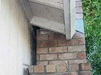 A chimney leaning away from the home on a Basalt foundation