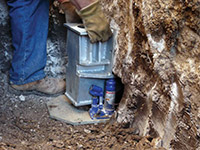Securing a foundation footing bracket for a foundation repair system in Delta.