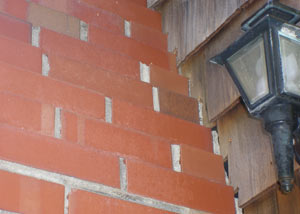 a repaired chimney in Carbondale that had shown serious foundation damage and was repaired with a helical pier system.