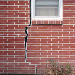A foundation with a large crack that's wider at the top than on the bottom in Rangely