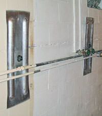 A foundation wall anchor system used to repair a basement wall in Basalt
